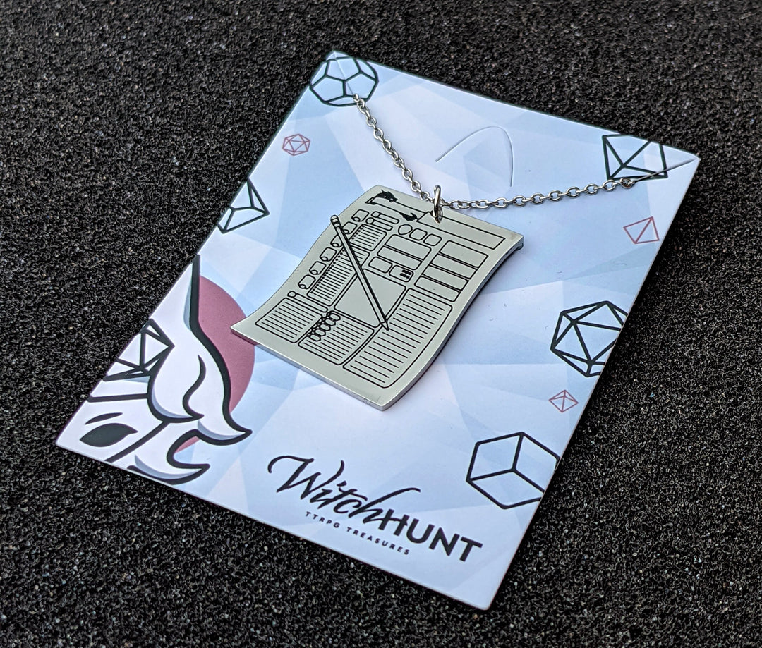 Silver character sheet necklace pendant on display card. Great Dungeons & Dragons necklace for TTRPG enthusiasts looking for distinctive character sheet jewelry.