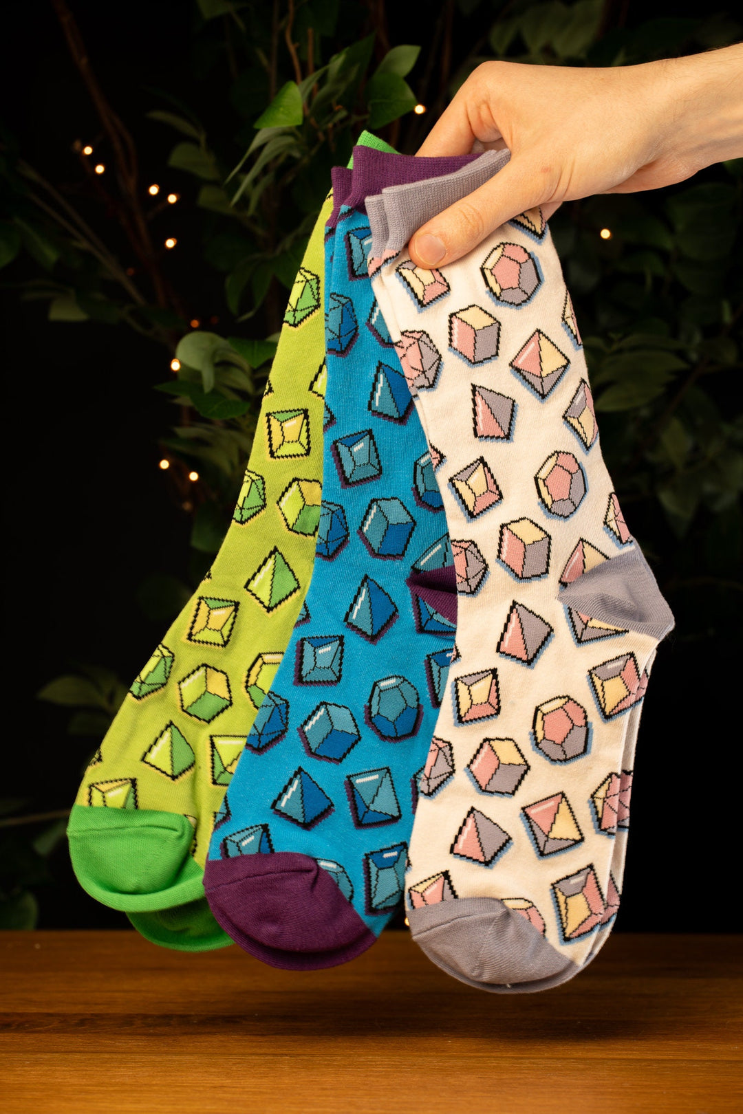 Polyhedral dice design sock - Green, blue and pastel colors.